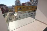 Zcela nový světlý byt 2+kk s velkým balkonem a garážovým stáním, Praha 9 - Harfa Park